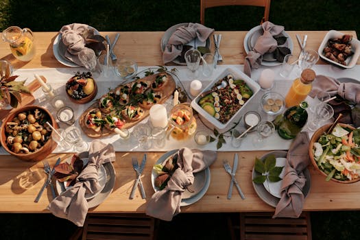 A beautifully set table outdoors with a variety of fresh dishes, ideal for celebrations.