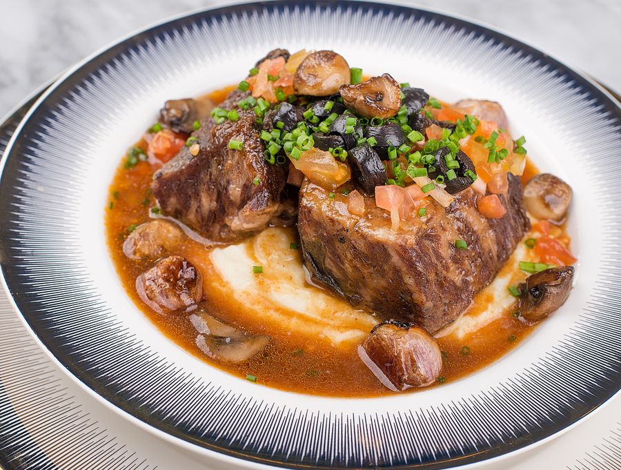 A rich braise with mushrooms and pearl onions