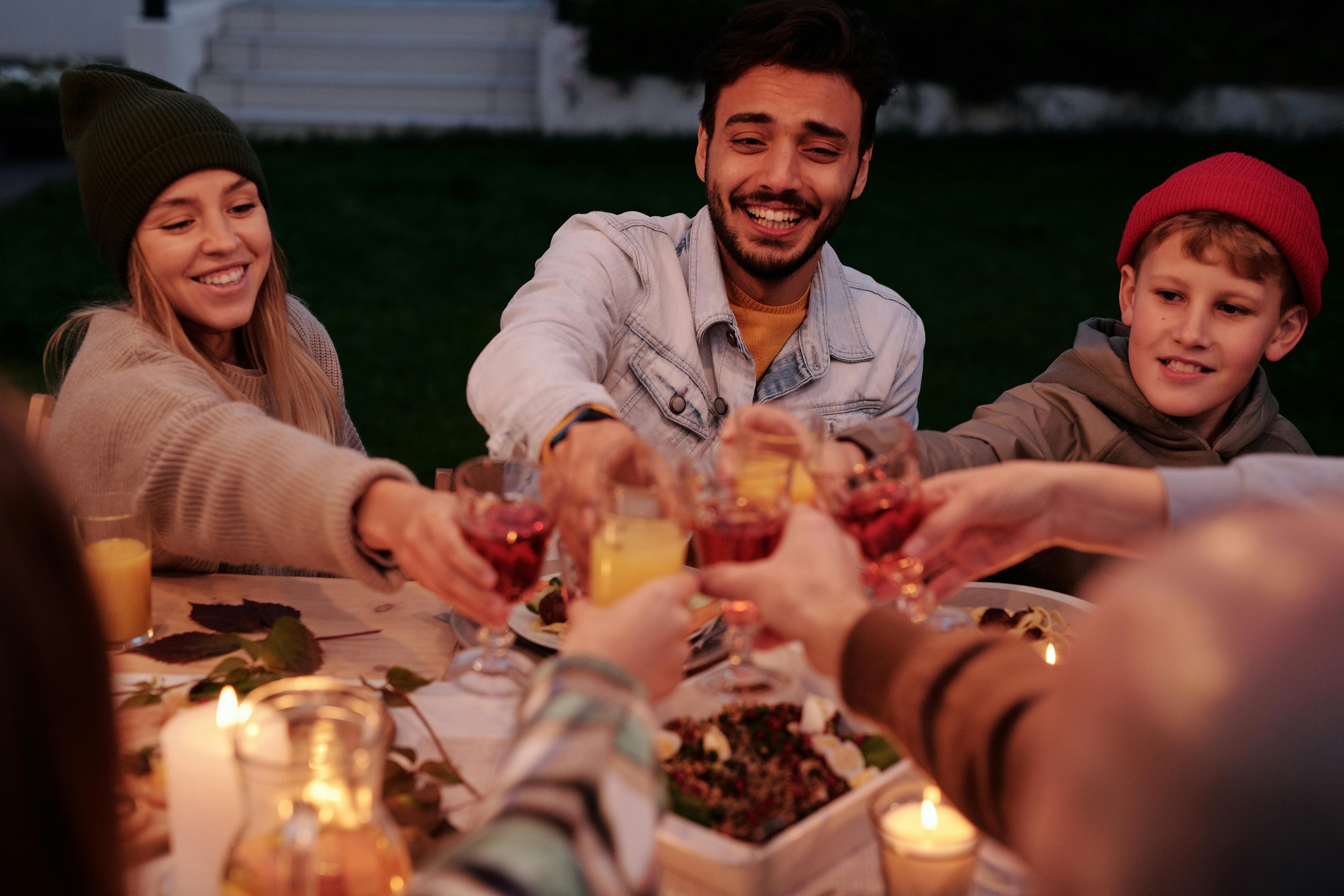 a group of people sharing a toast