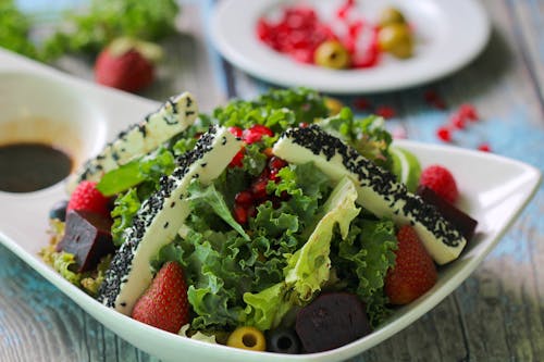 Green Vegetable Salad on White Ceramic Bowl