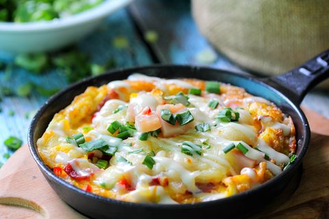 Cheesy skillet bake topped with fresh herbs — photo by Shameel mukkath on Pexels