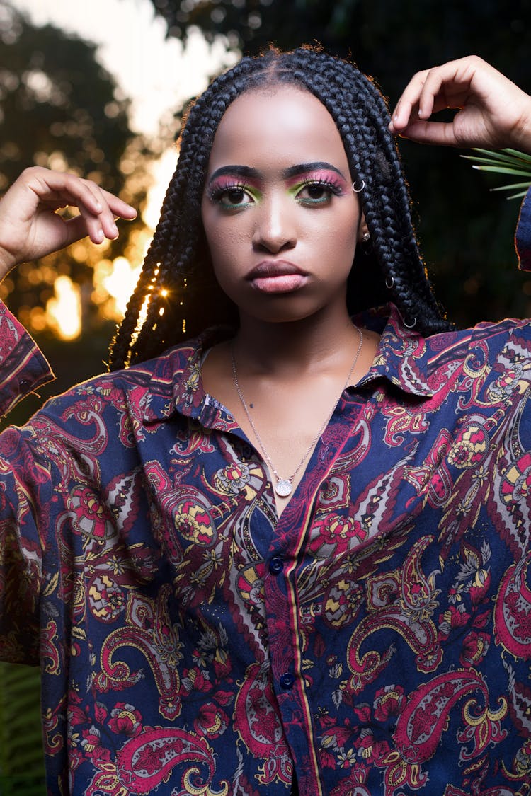 A Woman In Blue And Red Paisley Shirt