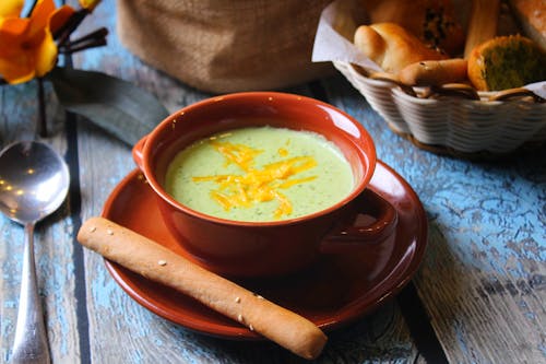 Soup in Red Ceramic Bowl