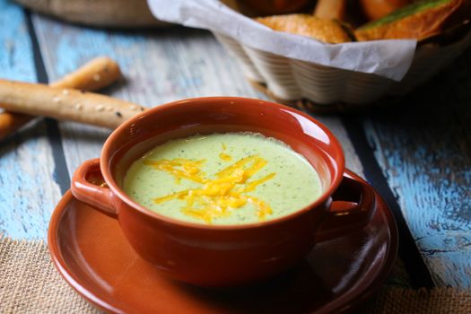 Delicious broccoli cheddar soup in a ceramic bowl, perfect for comfort food lovers.