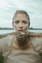Woman Submerged in a Lake