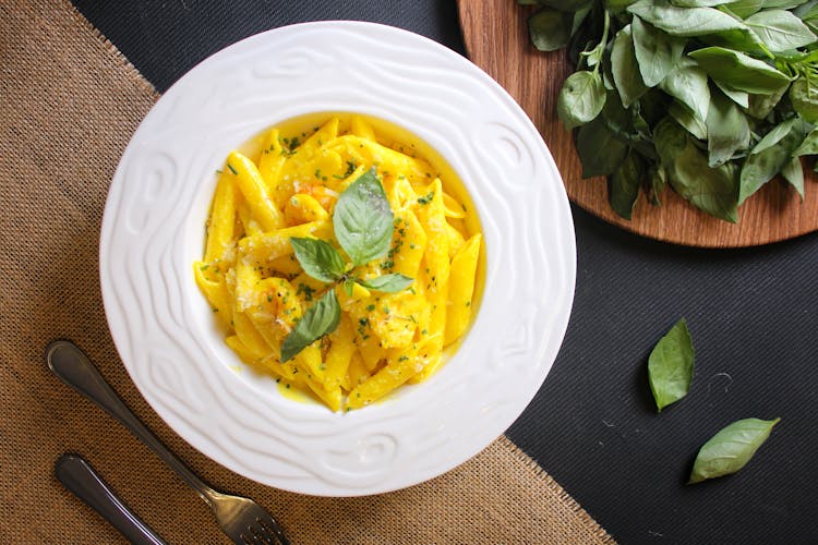 Pasta Dish On White Ceramic Plate