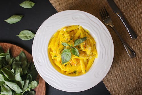 Close-Up Shot of a Pasta on a White Plate