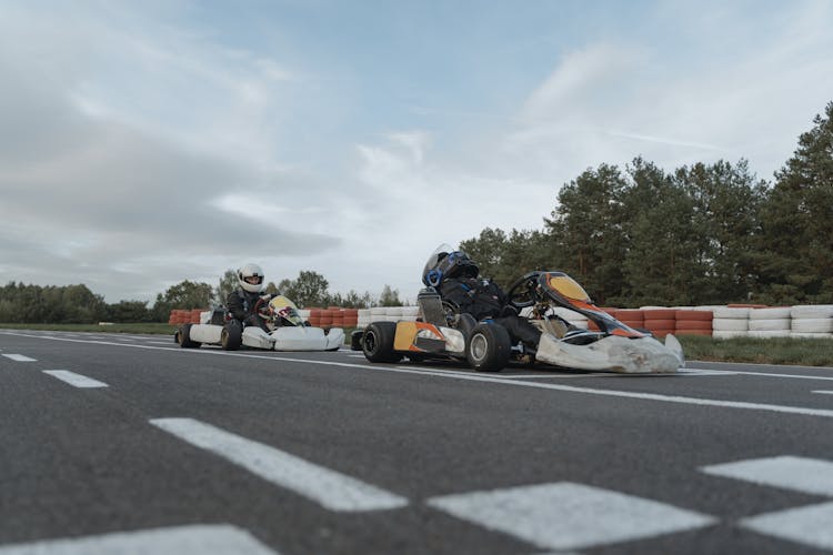 Racing Drivers Sitting In Gokarts