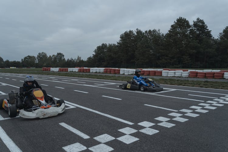 Go Kart Racers On The Starting Line Of A Race Track