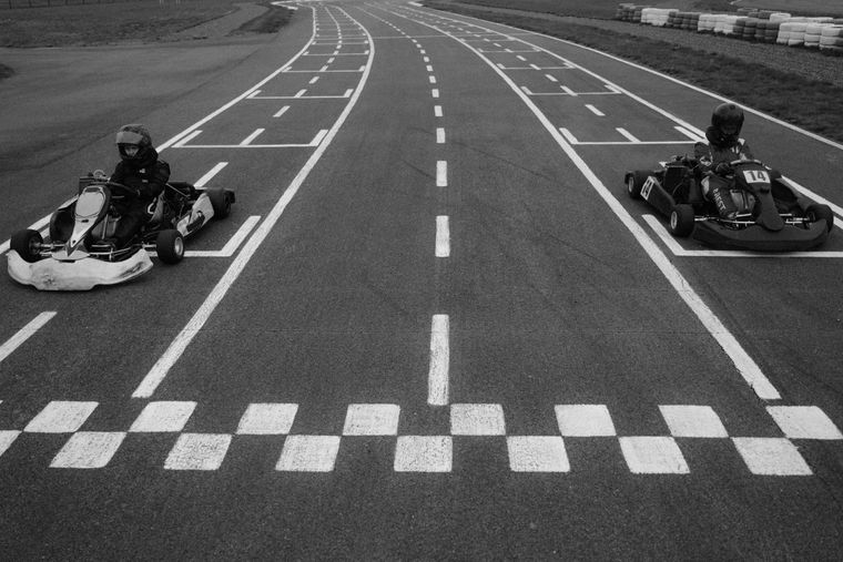 Karts rounding a track corner — Tima Miroshnichenko on Pexels