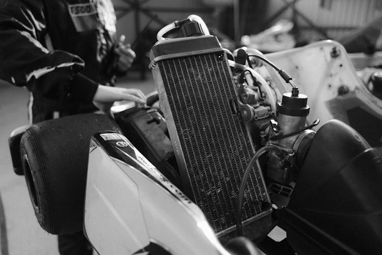 Grayscale Photo Of A Radiator Of A Go-Kart