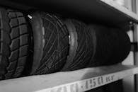 Grayscale Photo of Car Tire