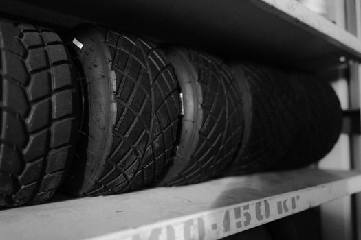 Grayscale Photo of Car Tire