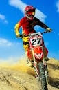 Photo of Person Riding Motocross Dirt Bike