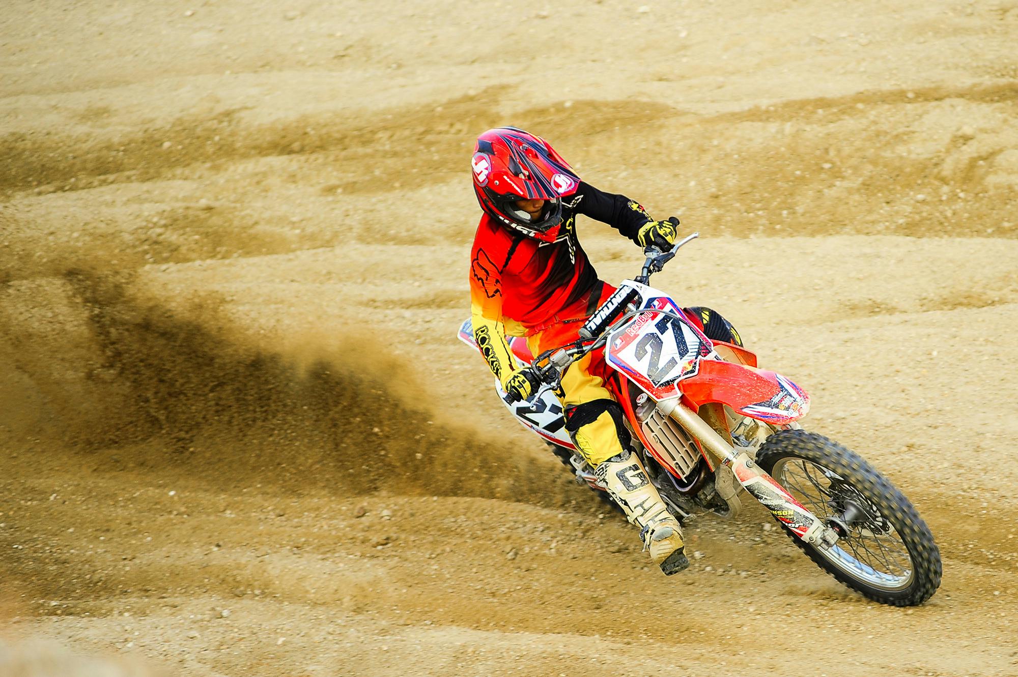 Person Riding Number 27 Motocross Dirt Bike · Free Stock Photo