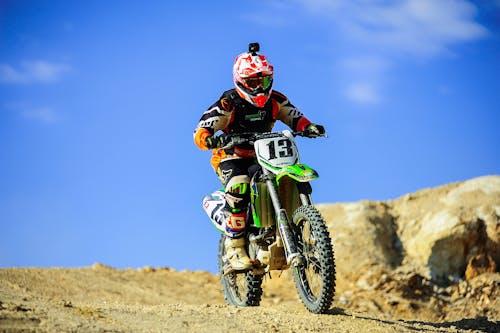 Free Person Riding Motocross Dirt Bike Stock Photo