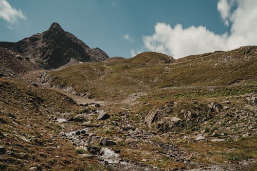 Free Rocky terrain with high mountain Stock Photo
