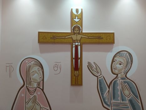 巴西南圣凯塔诺教堂墙上描绘着耶稣和圣人的艺术作品