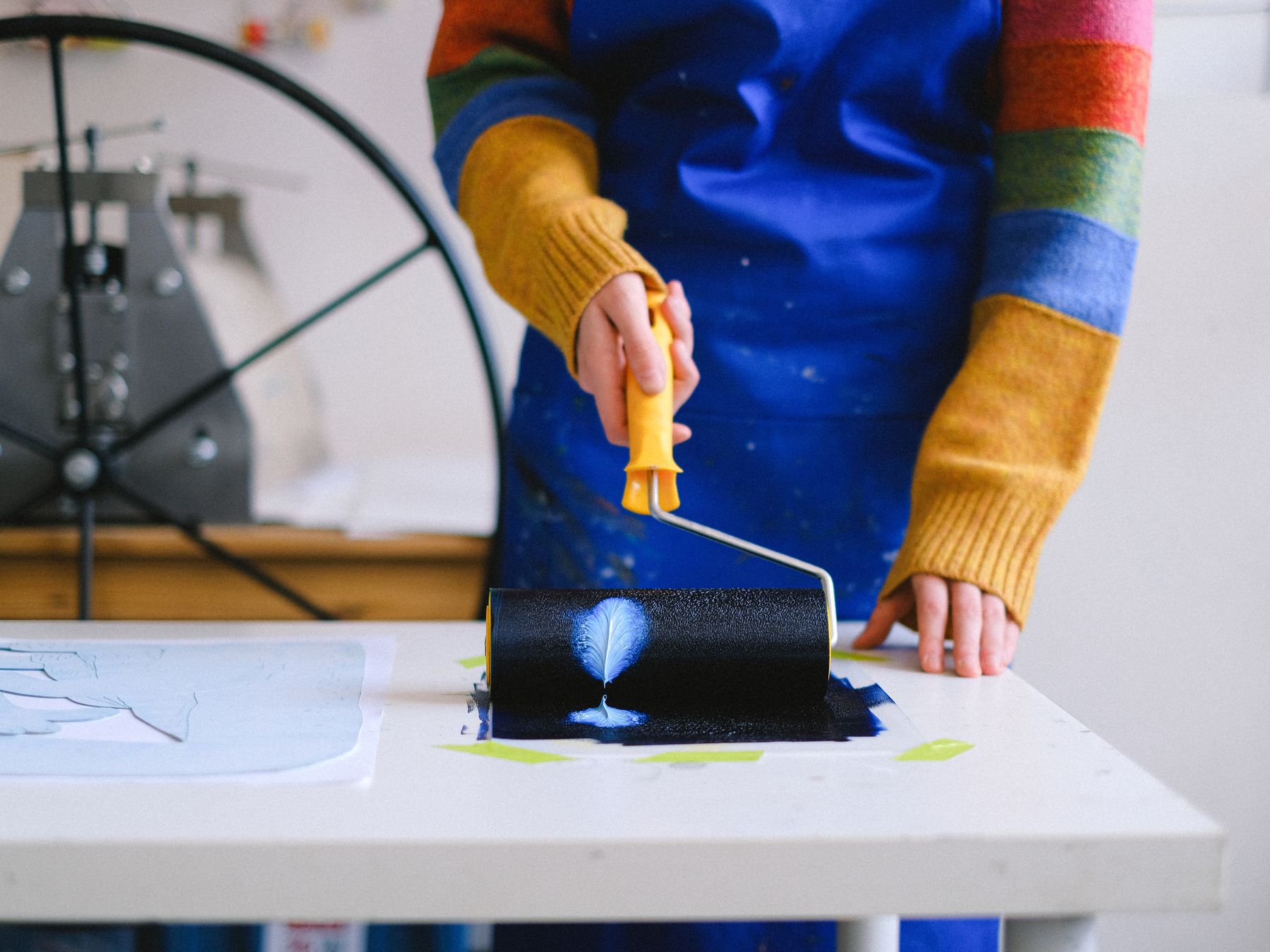 Kitchen Spraying in Dalston — careful masking before painting begins