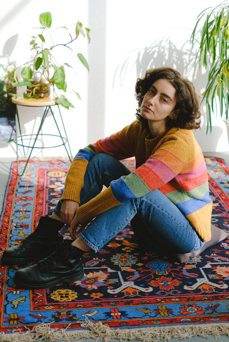 Sad Woman Sitting In Room On Floor