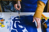 Artist painting picture for new project