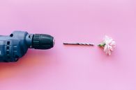 Black and Pink Dslr Camera on Pink Table