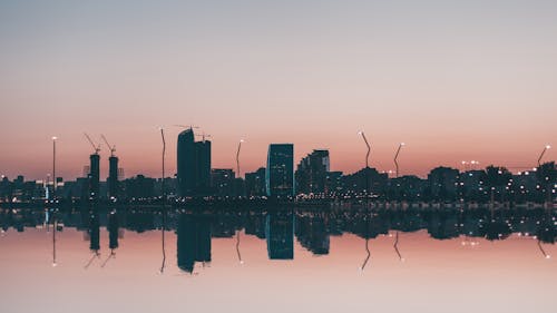 Free Silhouette of City during Nighttime Stock Photo