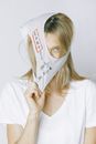 Woman in White Crew Neck T-shirt With White Face Mask