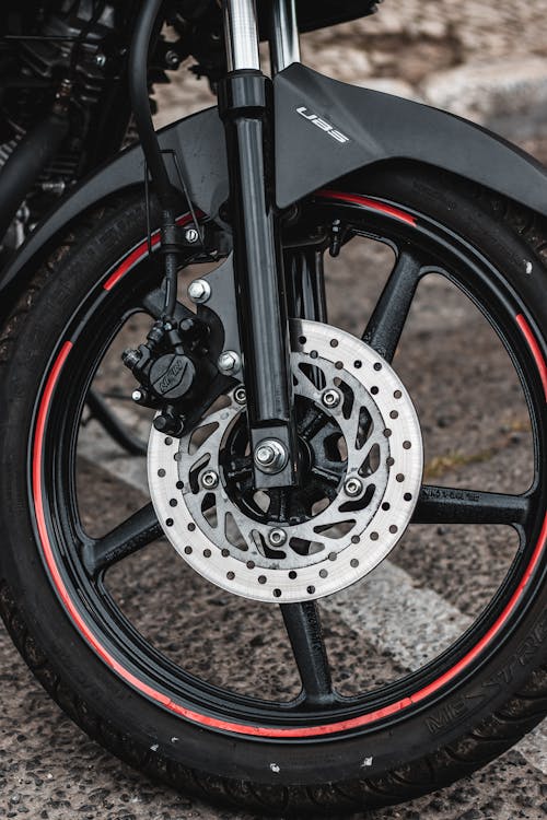Free Photo of a Wheel of a Motorcycle  Stock Photo