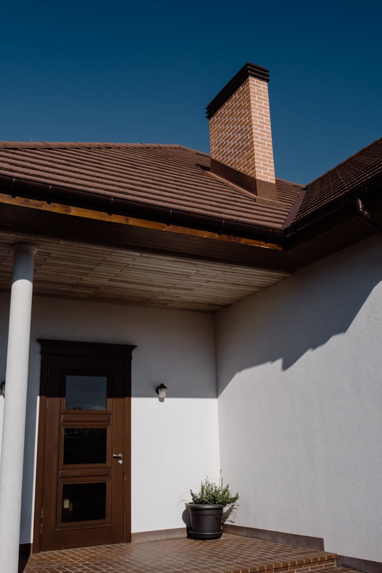 A House With Chimney On The Roof