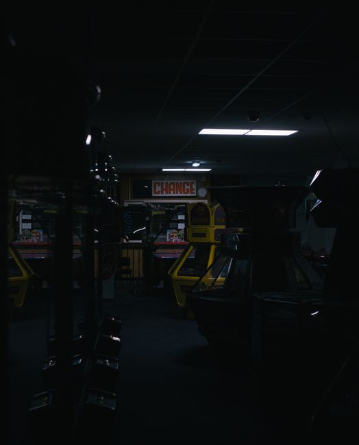 old arcade machine in dark room