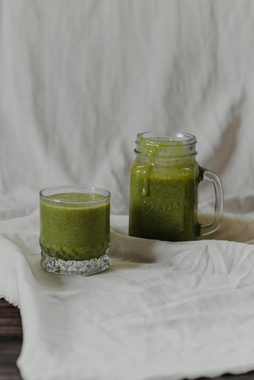 Clear Glass Mug With Green Liquid