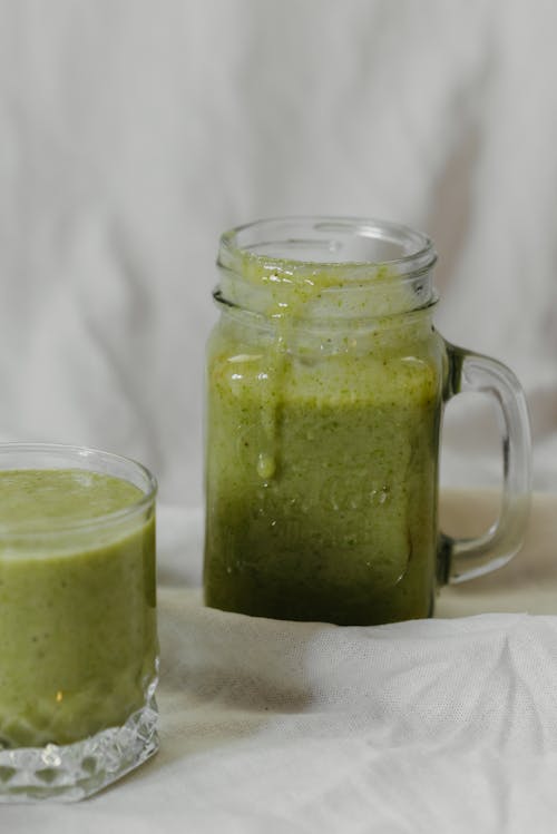 Clear Glass Mug With Green Liquid