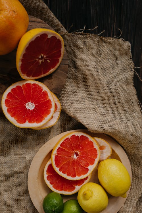 Sliced Grapefruit on a Woven Fabric