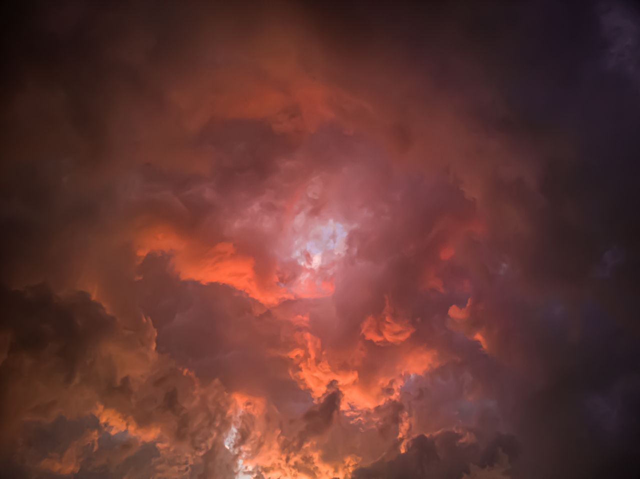 vivid and dramatic sunset cloudscape with intense pink and purple hues
