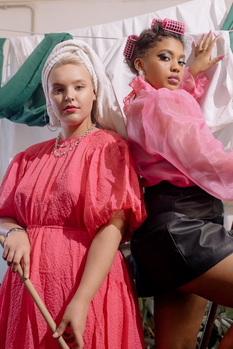 Two Women In Pink Outfit