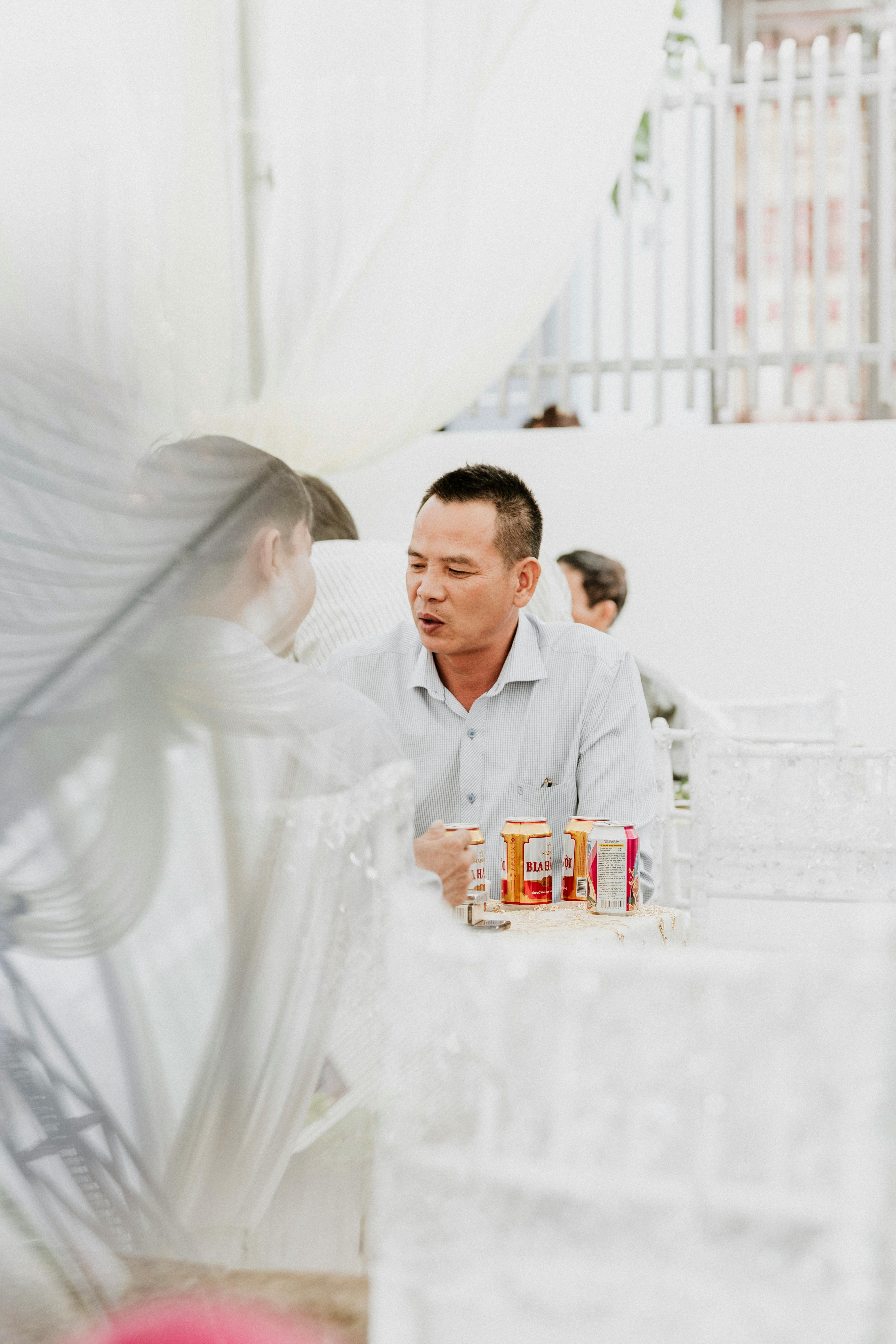 man sitting at table