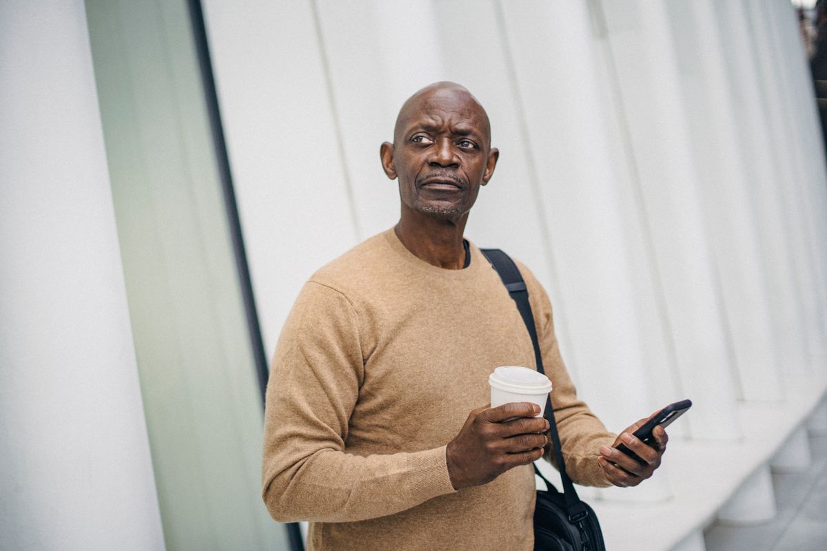 Customer using a phone for mobile top up