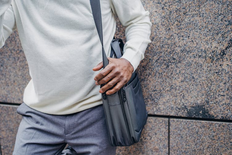 Crop Black Man Near Stone Wall