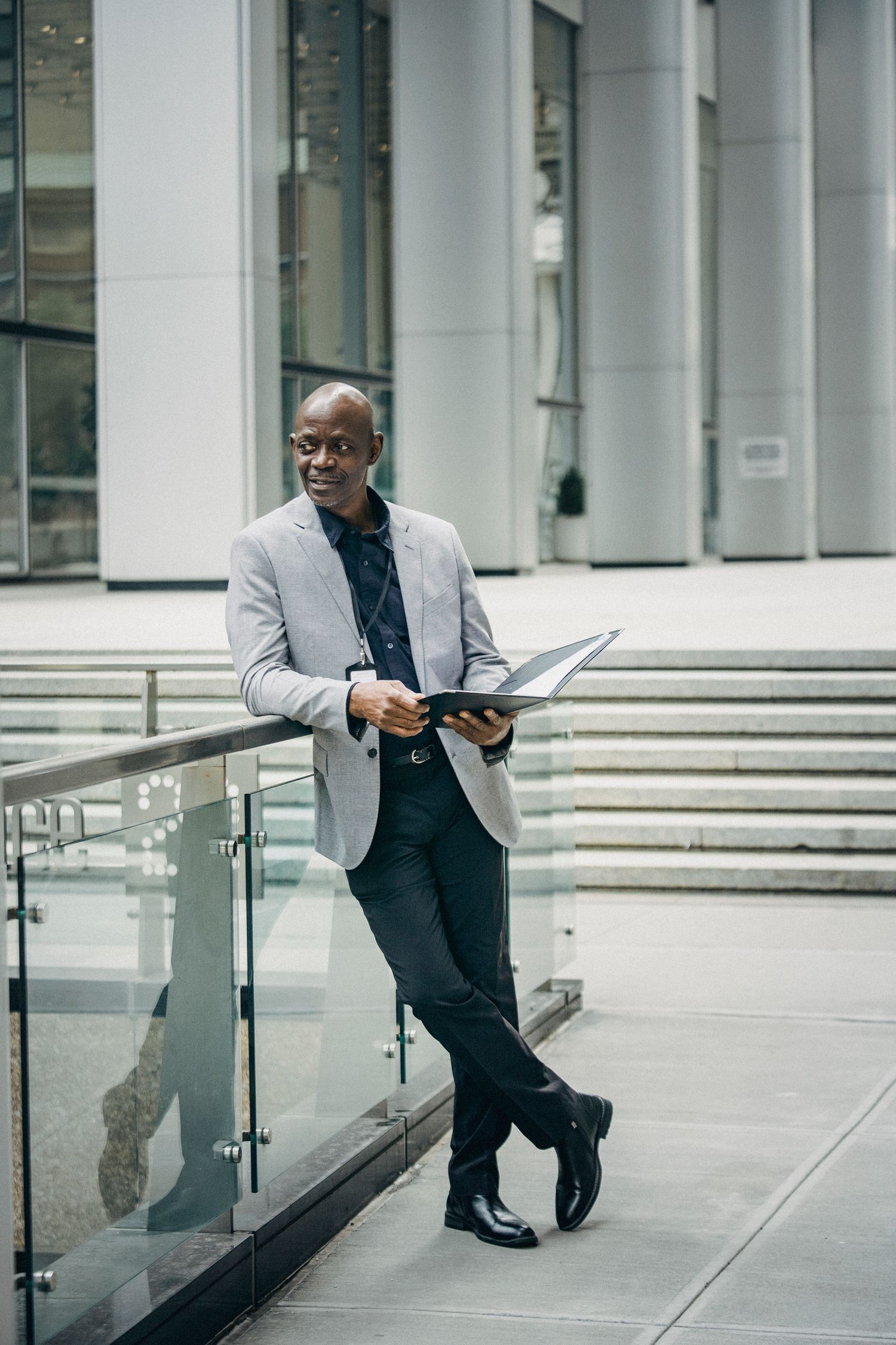 Intelligent African American Businessman Carrying Papers Free Stock Photo intelligent-african-american-businessman-carrying-papers-free-stock-photo