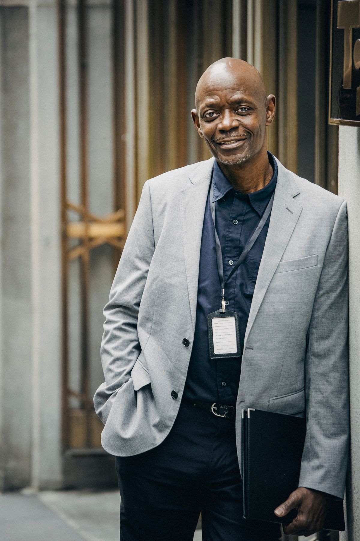 Nigerian professional outside a government building