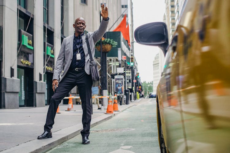 Black Confident Happy Businessman Catching Cab