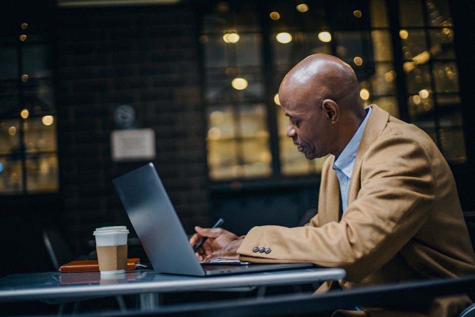 Entrepreneur working on business growth at coffee shop