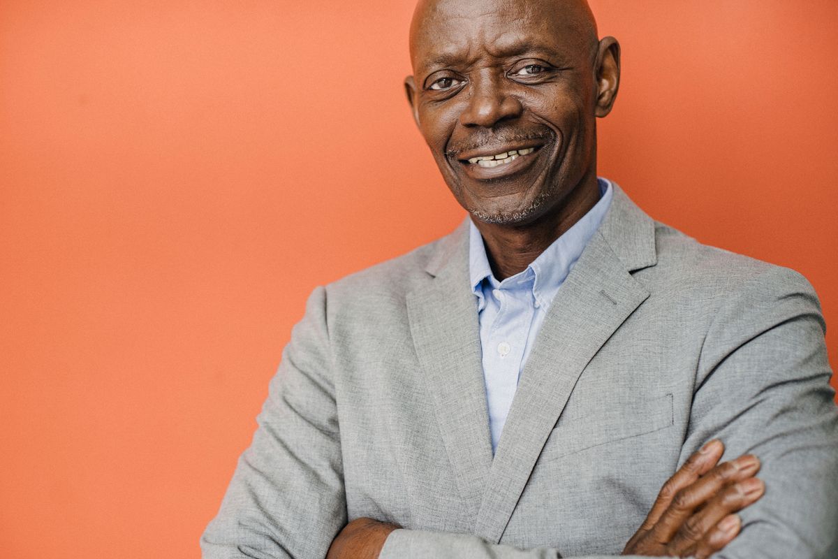 Nigerian professional planning a move abroad with a passport