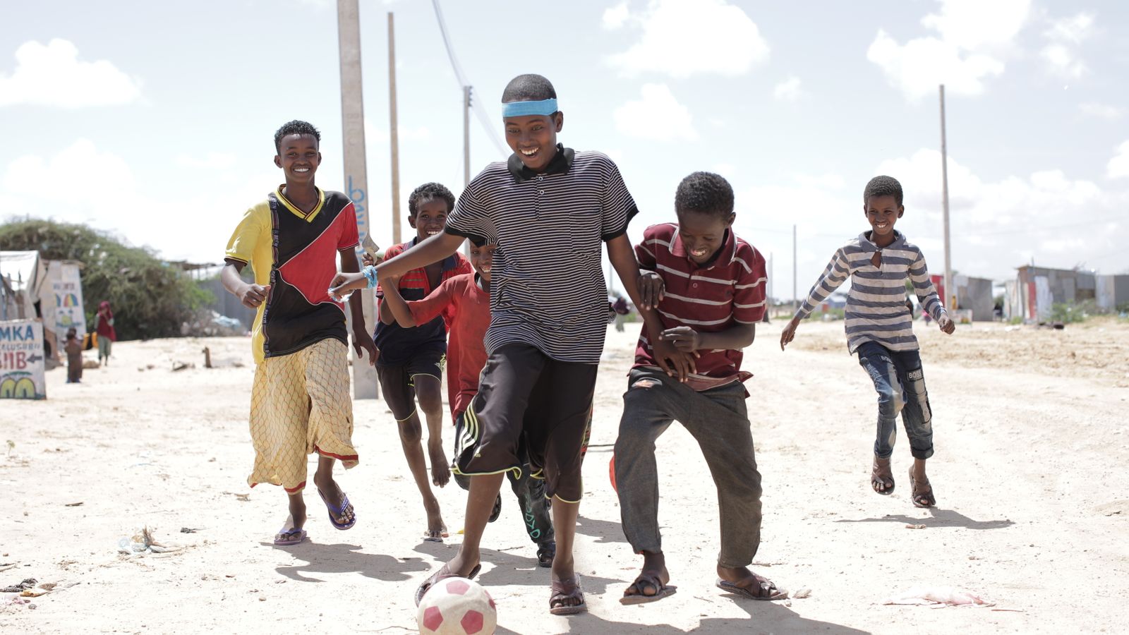 A group of friends playing football, Somalia
