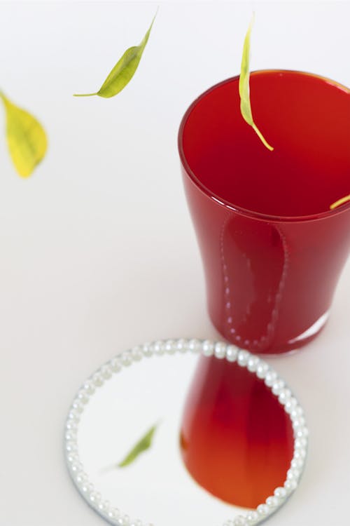 Clear Drinking Glass With Red Liquid 