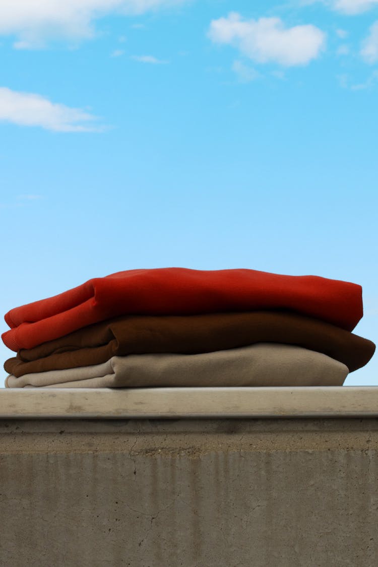 Folded Fabrics On Concrete Surface