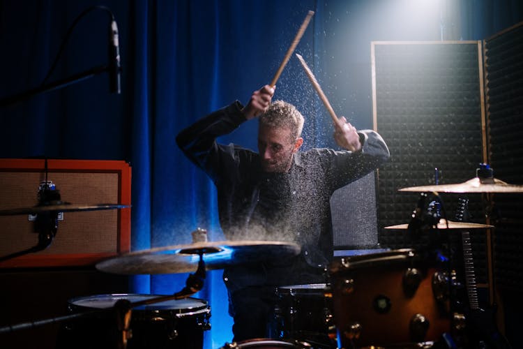 Man Playing The Drums