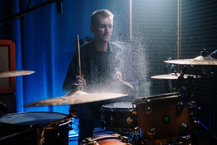 Man Playing Drum Set