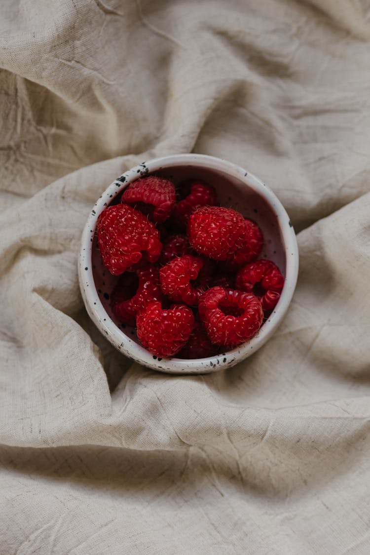 Raspberries In A Ceramic Bowl 